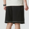 Logoshorts «Svart med hvite sømmer»