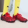 PUMA x CHRISTIAN PULISIC TACTO II fotballsko til barn for fast/kunstig underlag